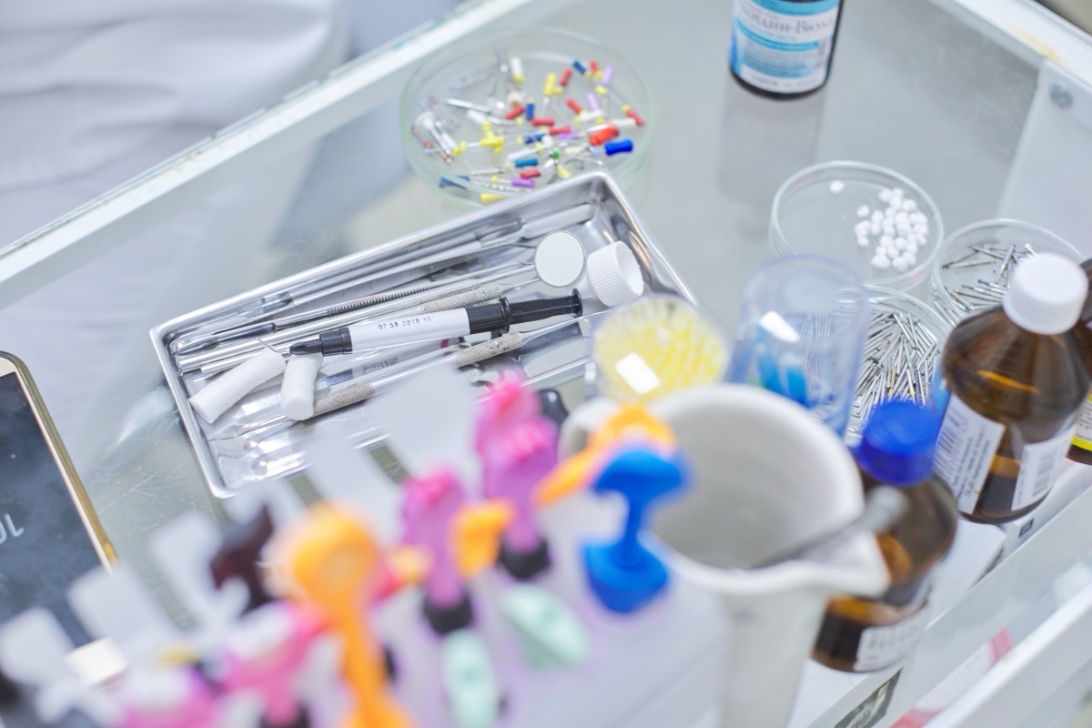Dental instruments, shade guides and materials on a clear tray
